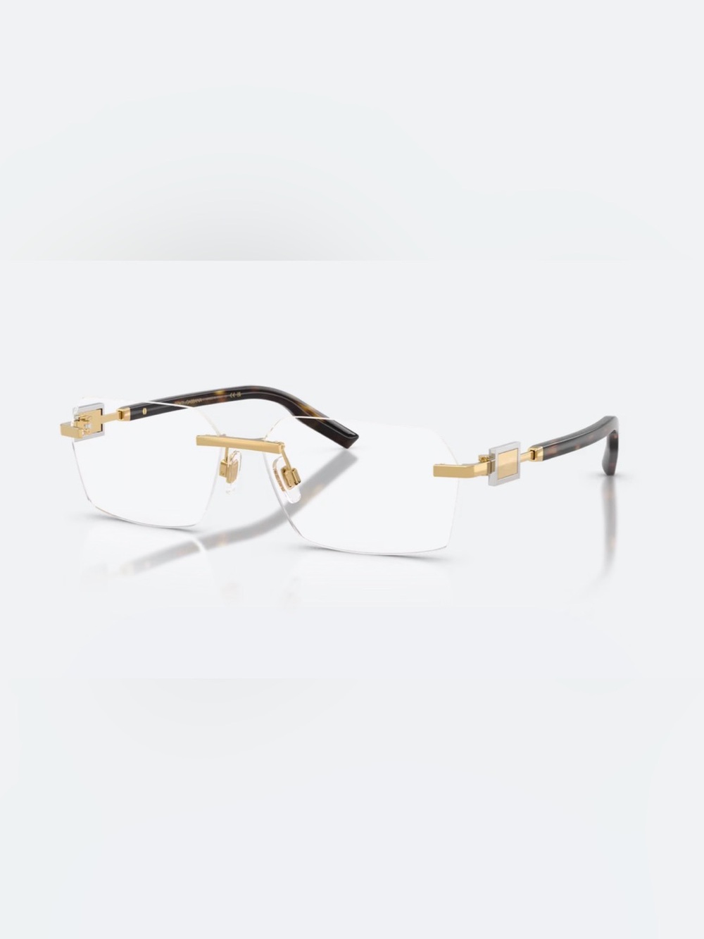 Dolce & Gabbana Rimless Glasses with Gold Accents and Tortious Temples